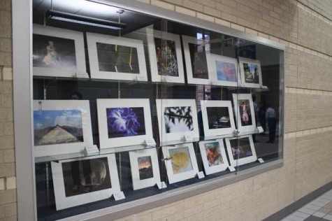 Competition submissions are displayed in the glass case located by the auditorium.