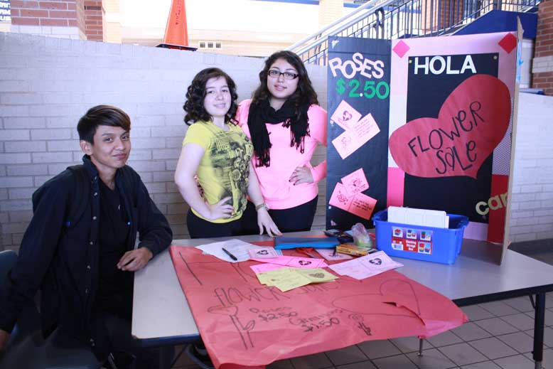 Daniel Ruiz, Veronica Vasquez and Diany Paz promote the HOLA Valentine's Day sale during lunch.