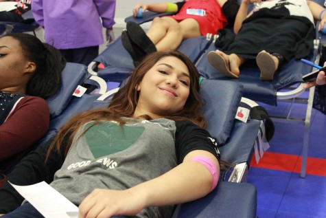 Junior Maysha Talat is done getting her blood drawn, and happy about it.