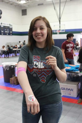 First-time donor Haley Dunn showing off her commemorative sticker. 