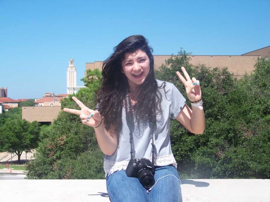 Mercedez Rodriguez chills by the library at the University of Texas at Austin. 