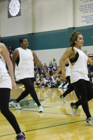 Medina dances to a mash up of today’s pop hits like “Hey Mama” by Nicki Minaj during the Dazzlers performance at the Homecoming pep rally.