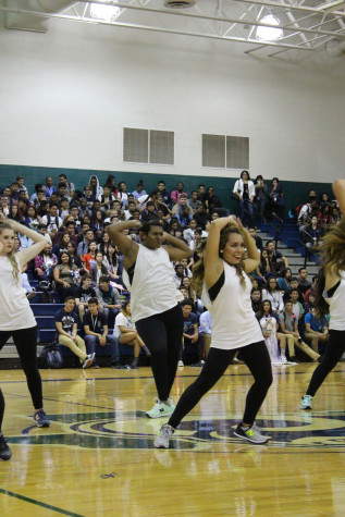 Medina shows off his skills in a mash up of today’s pop hits like “All I Do Is Win” by DJ Khaled during the Dazzlers performance at the Homecoming pep rally.