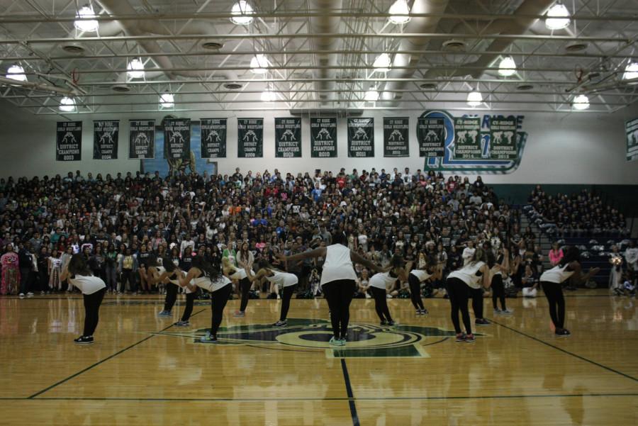 Medina is the center of attention during the performance of hit single “Hit the Quan” by iHeart Memphis during the Homecoming pep rally.