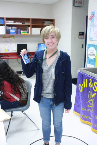 Freshman Payton Phipps tries out her new ID badge.