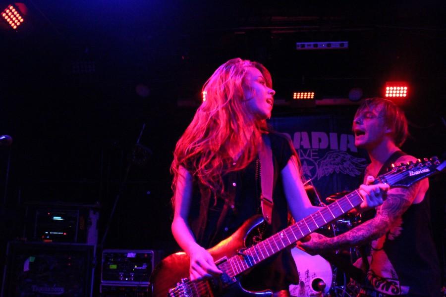 Lockwood and Mercedes meet in the middle of the stage to rock out and play openly.