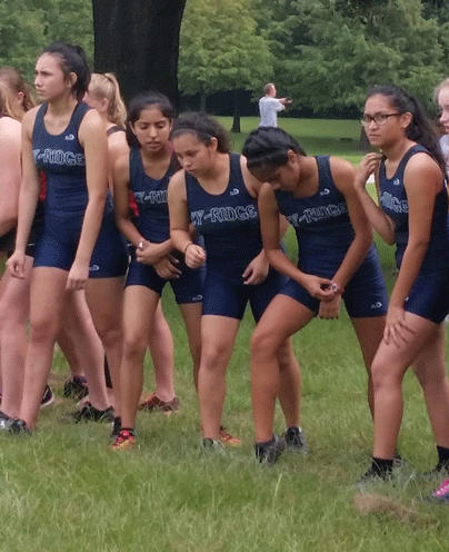 The JV cross country girls set up at the starting line at the the Sam Houston Cross Country Meet Saturday, August 27, 2016.