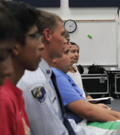 Students intently pay attention to the presentation as Sgt. Guilbeau and Sgt. Davis talk.