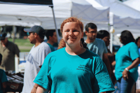  Alexandra Strode holding produce in the second annual produce sale.