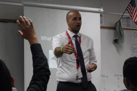 English teacher Caleb Sanderson answers questions after his lesson on never giving up.