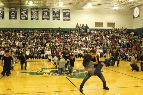 Bryan Cornejo flips Madeline Galindo in a salsa move.