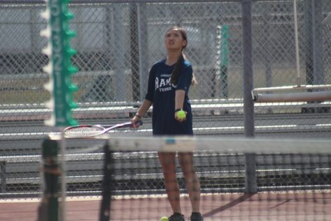 An Dang about to strike a mean serve.