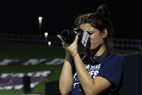 The Cypress Ridge students brought out the blue and white baby powder along with ribbons during the halftime show. 