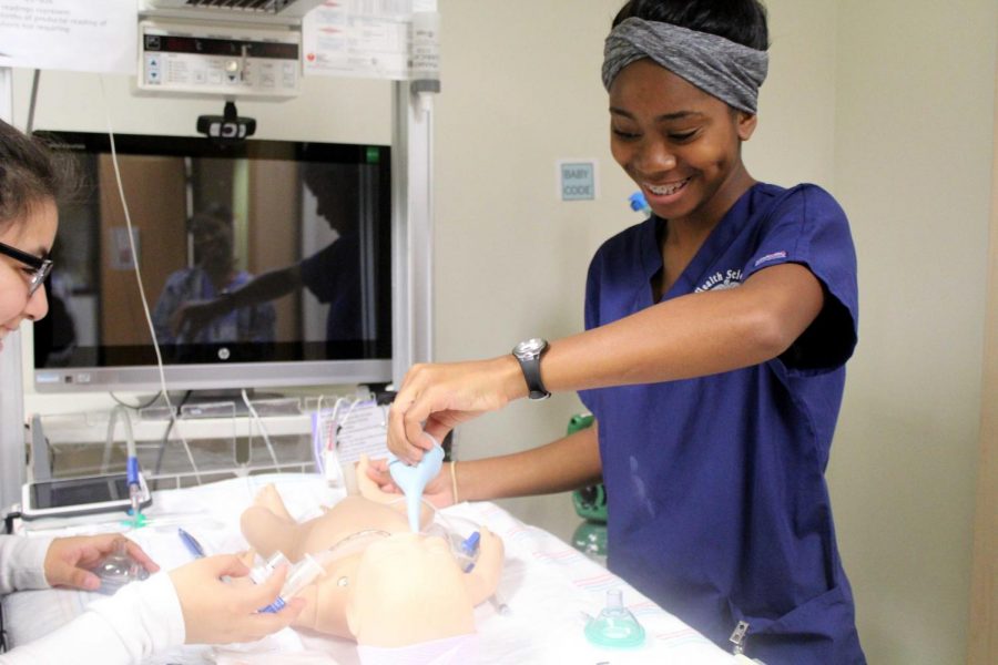 Health Science and HOSA save lives by volunteering and assisting in the semi-annual blood drive.