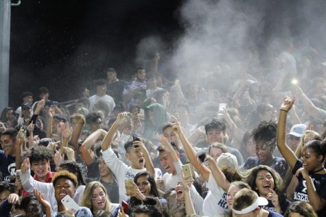 The Cypress Ridge students brought out the blue and white baby powder along with ribbons during the halftime show. 