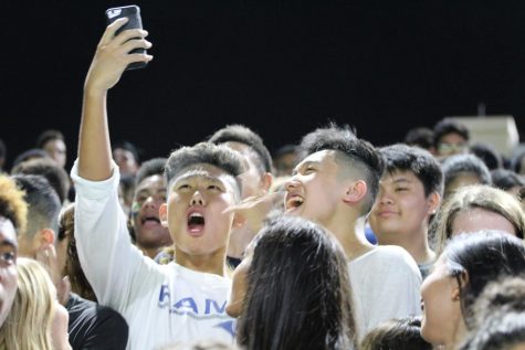 The Cypress Ridge students brought out the blue and white baby powder along with ribbons during the halftime show. 