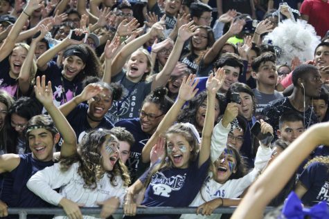 The Cypress Ridge students brought out the blue and white baby powder along with ribbons during the halftime show. 